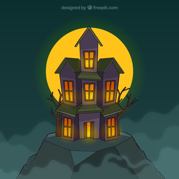 Spooky house with full moon