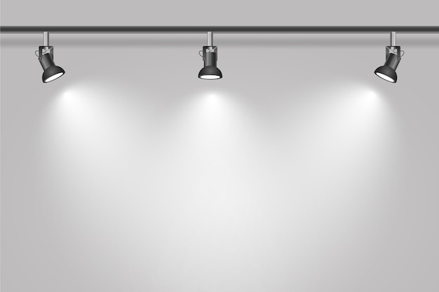 Free Vector spot lights on studio white wall background