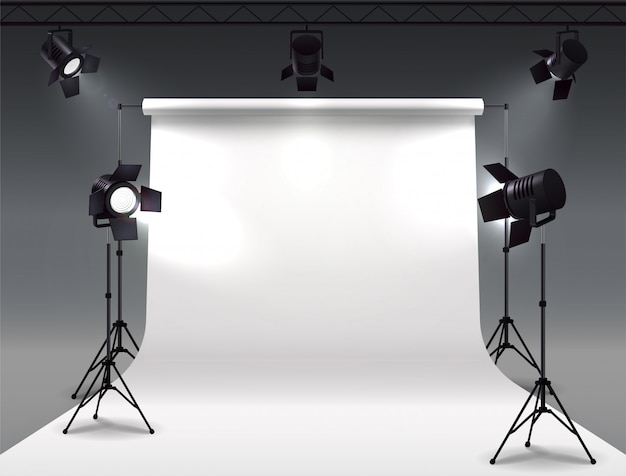 Spotlights realistic composition with cyclorama and studio spot lights hanging on reel and mounted on stands