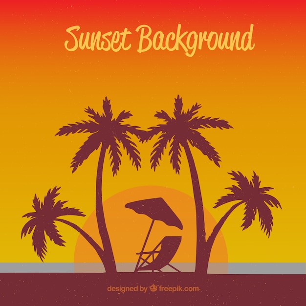 Summer background with palm trees at sunset