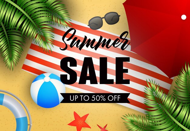 Summer sale lettering with beach mat, ball and umbrella