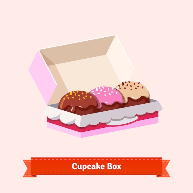 Free Vector tasty looking cupcakes in the cardbox