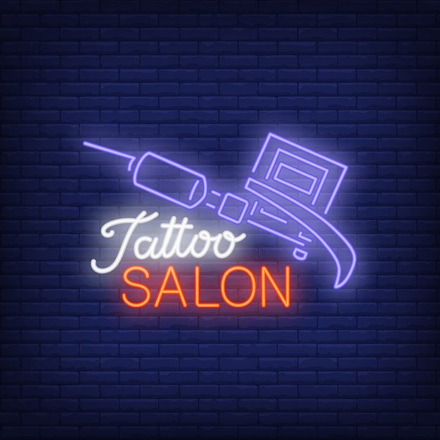 Free Vector tattoo salon neon text with tattoo machine. neon sign, night bright advertisement