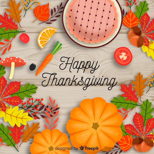 Free Vector thanksgiving day background in flat design with autumn elements