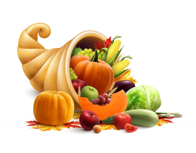 Thanksgiving or golden horn of plenty concept with cornucopia full of vegetables and fruit produce