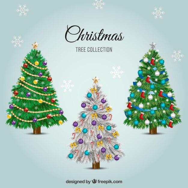 Three elegant christmas trees with ornaments