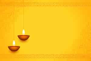 Free vector traditional shubh deepavali yellow background with text space and diya design