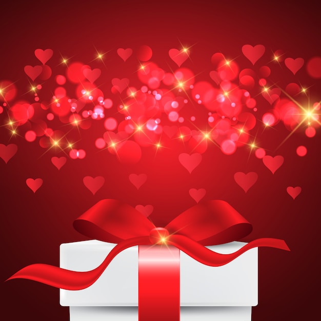 Free Vector valentine's day background with gift box on bokeh lights