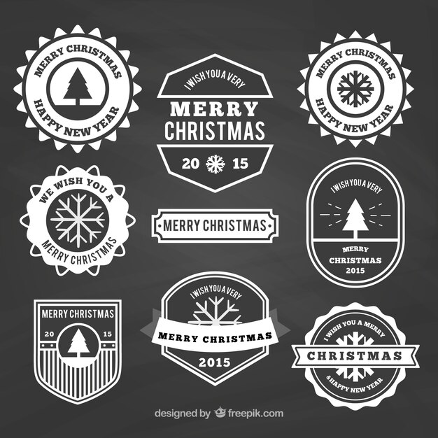 variety of christmas insignias on blackboard