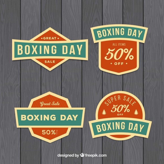 Free vector vintage boxing day sale badge in orange and blue