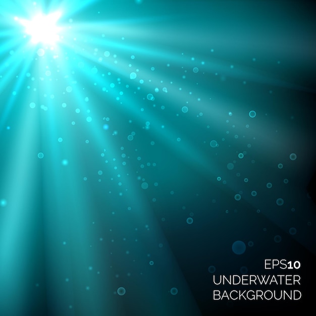 Free vector under water blue deep ocean  background with bubbles. sunshine rays in water sea