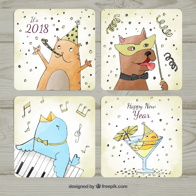 Free vector watercolor new year 2018 cards with animals