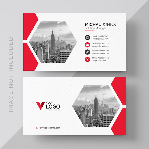 White business card with red details