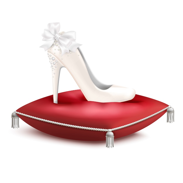 Free vector white decorated high heel wedding princess party bridal shoe on red satin pillow realistic composition