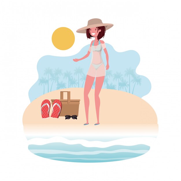 Woman on the shore of the beach with picnic basket