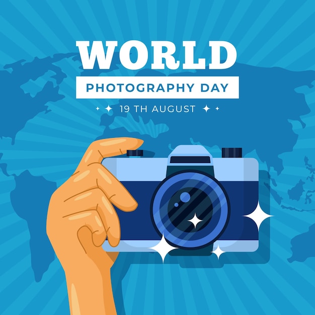 Free Vector world photography day with hand holding camera