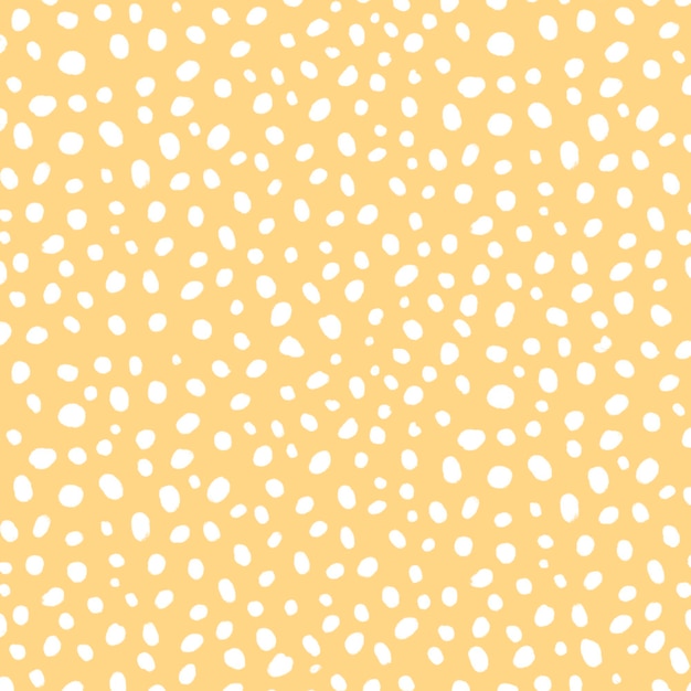 Yellow background vector with white dot patterns