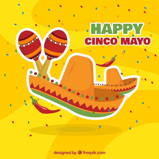 Yellow background with mexican hat and maracas