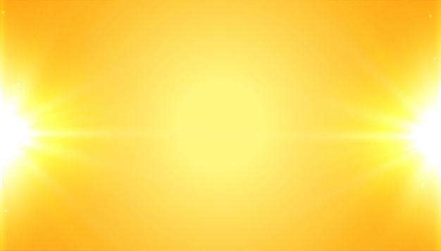 Free Vector yellow background with shiny glowing light effect