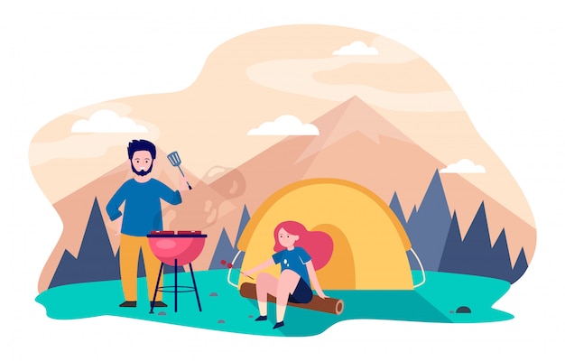 Young couple camping at mountains