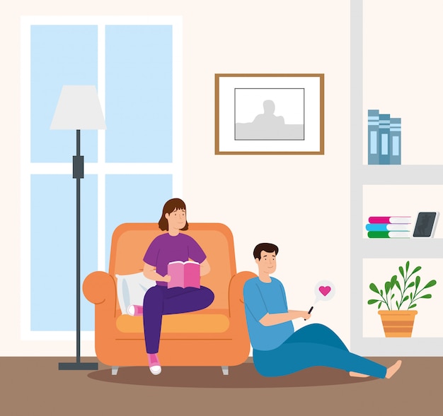 Young couple reading book in livingroom