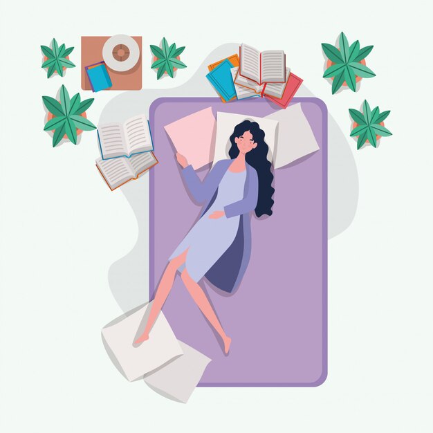 Young woman relaxing in mattress in the bedroom