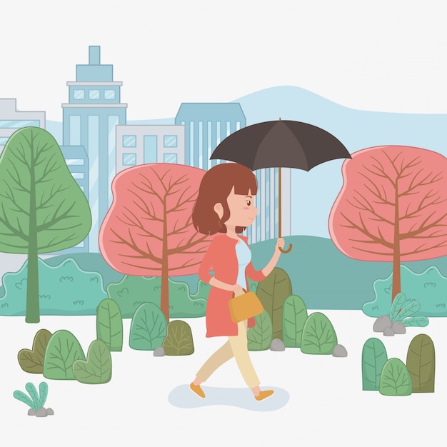 Free Vector young woman walking with umbrella in the park