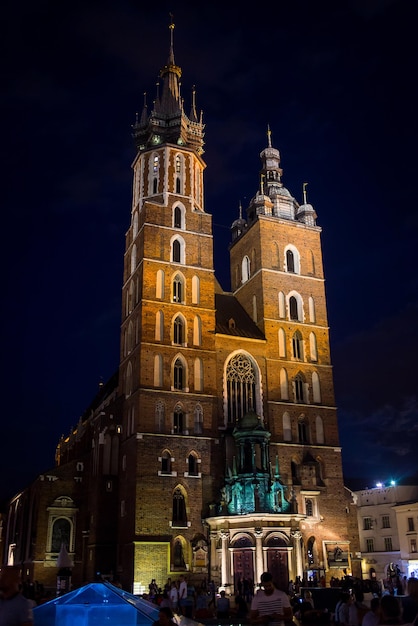 09 July2017Poland Krakow Market Square at nightThe Main Market Square in Cracow is the most important square of the Old Town in CracowSukiennice the Cloth Hall a landmark of Rynek the market square