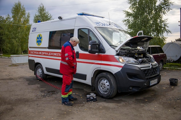 10102022 Kyiv Ukraine Paramedics near an ambulance during training