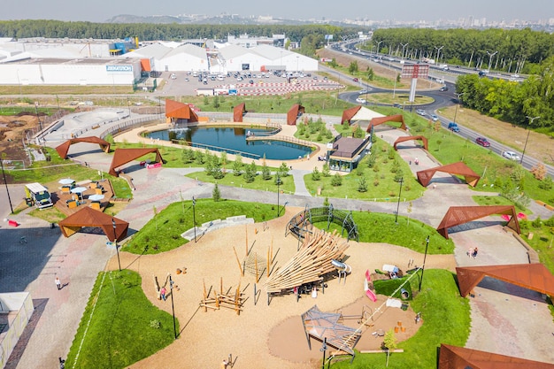 18 August 2021 Ufa Russia Aerial view of big modern child playground in city park Urban development and leisure concept