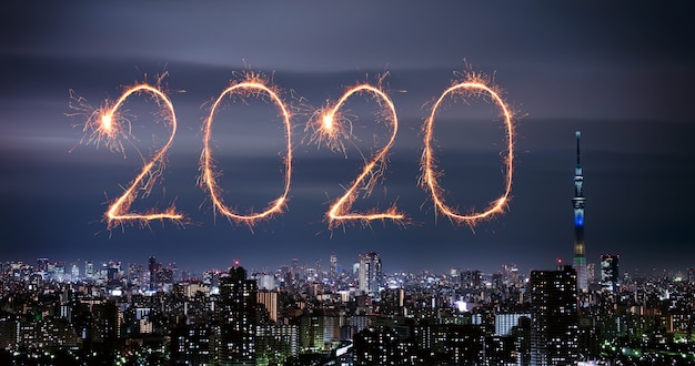 2020 Happy New Year fireworks over Tokyo cityscape at night, Japan