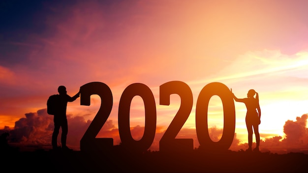 2020 Newyear  Couple tries to push number of 2020 Happy new year 