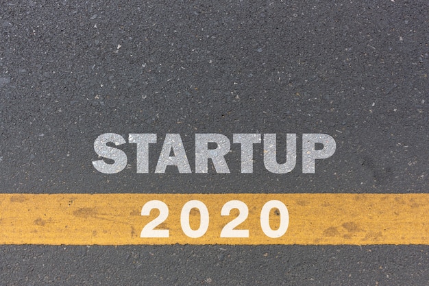 2020 year and business concept.  startup message or words print on the road background