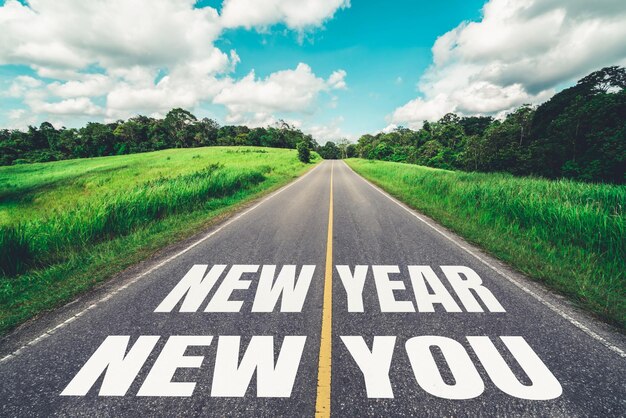 2021 New Year road trip travel and future vision concept . Nature landscape with highway road leading forward to happy new year celebration in the beginning of 2021 for fresh and successful start .