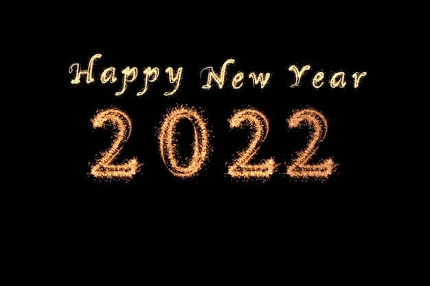 2022 and Happy New Year written with Sparkle firework on dark background,