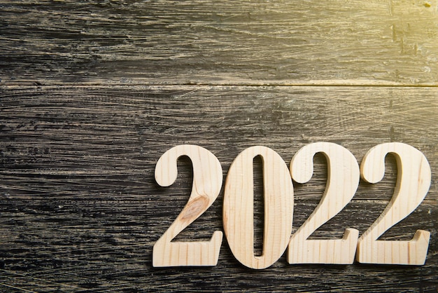 2022 on wooden background. Happy New Year 2022