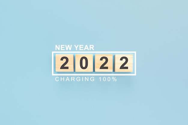 2022 on wooden cubes New Year Background Year 2022 written on wooden cubes charging new year