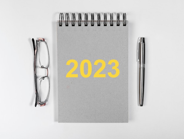 2023 new year planning on planner diary pen and glasses