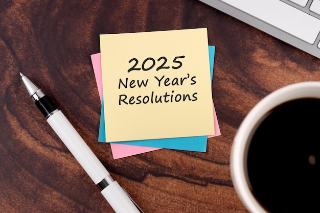 Photo 2025 new years resolutions text on adhesive note