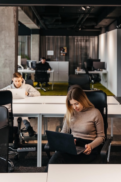 23112018 Kyiv Ukraine photo of young people working at a computer in a modern coworking office