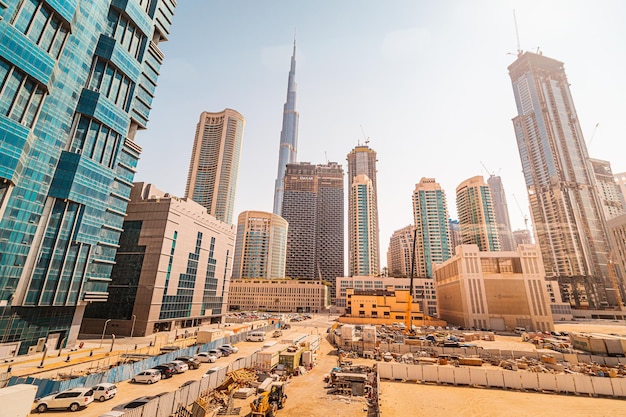 24 February 2021 Dubai UAE numerous construction sites and car parking around the famous tallest skyscraper Burj Khalifa