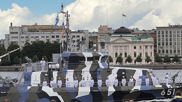 31 july 2022 Saintpetersburg Russia russian military ship going along Neva River on Day of the Russian Navy