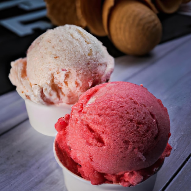 3d illustration rendering of ice creams of different colors and flavors decorated on colorful background Selective focus