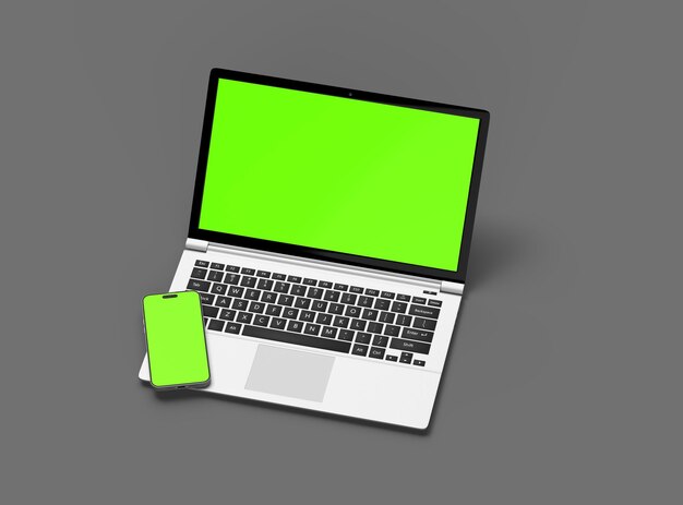 3D Render of laptop and phone with green screen on a dark background