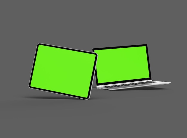 3d render of laptop and tablet with green screen on a dark background