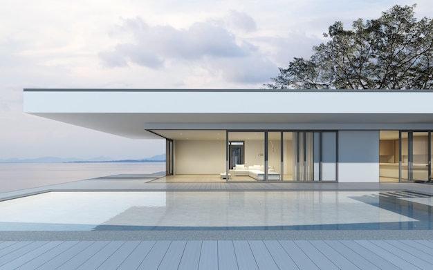 3d rendering of modern house with swimming pool on sea background.