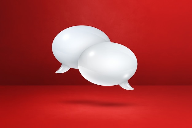 3D white speech bubbles isolated on red background