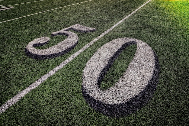 50th yard line of the stadium with green lawn