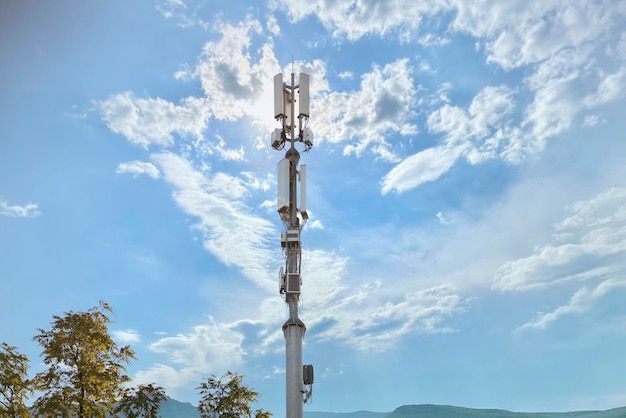 A 5g station antenna in the city against the sky network receiver