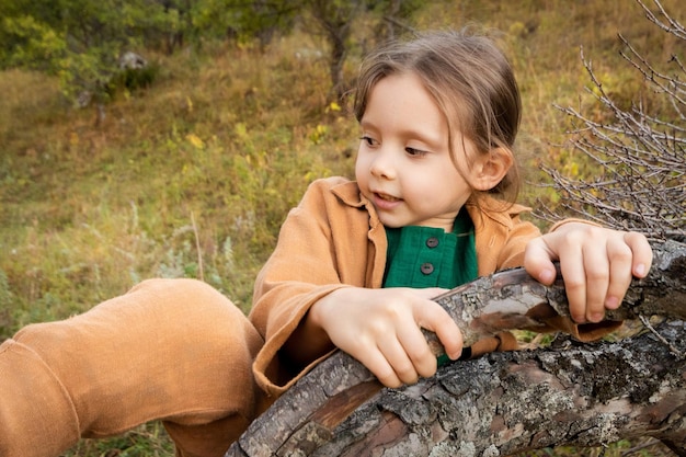 A 5yearold girl is learning how to survive in the wild